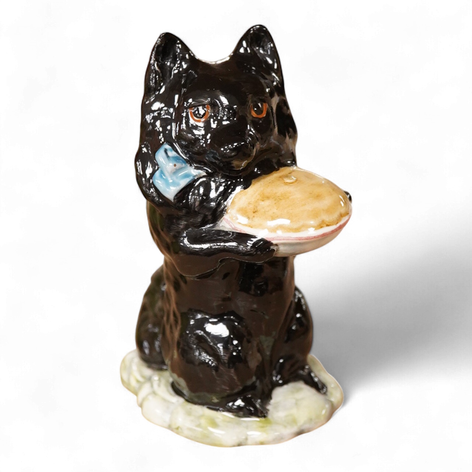 A Beatrix Potter, stamped F Warne and Co Ltd, Beswick figure of “Duchess” with pie, 10cm high.